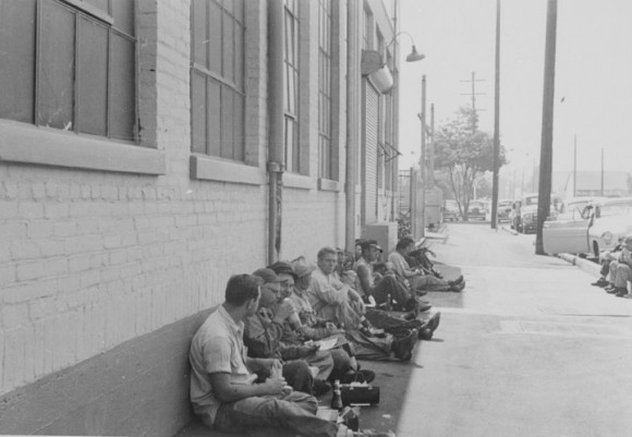 mployees on a lunch break outside the Anaconda Wire and Cable Company building