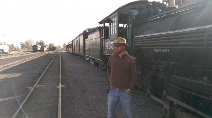man in front of train engine