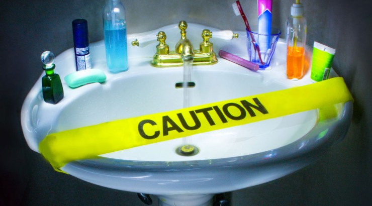 sink covered by caution tape