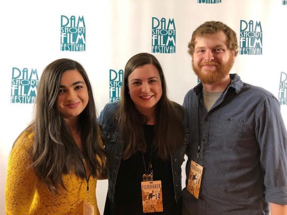 Chapman Filmmakers at Dam Short Film Festival in front of step and repeat