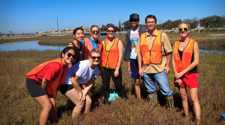 Professor Keller and students, photo taken during research at the Huntington Beach marshes, Fall 2011.