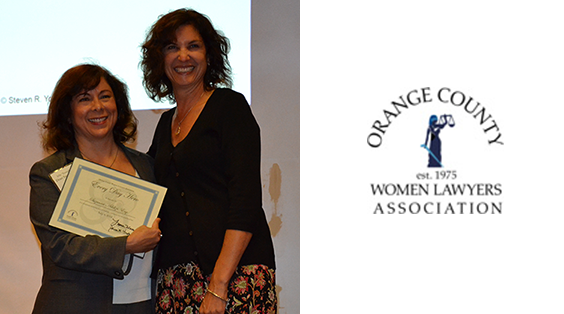 Suzanna Adelizi, Assistant Dean of Career Services (left) received the Everyday Hero award given by OCWLA’s Jaimi Groothius (right)