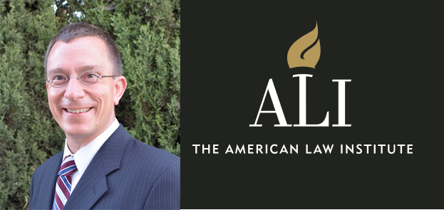 Dean Donal Kochan headshot with Ali logo