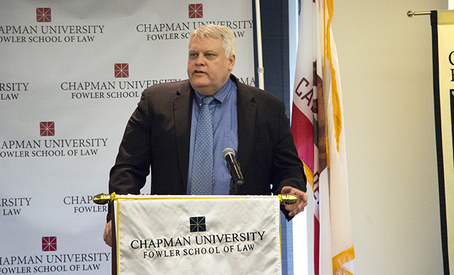 Thronson speaking at podium