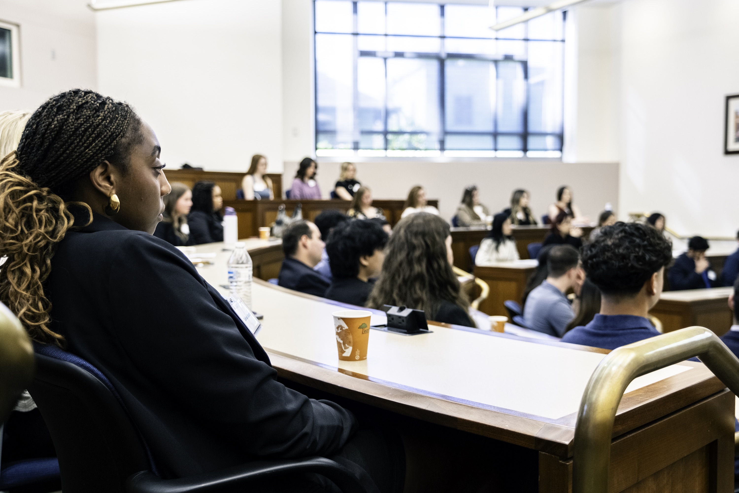 Photograph of prosepctive students attending a panel discussion during scholars weekend