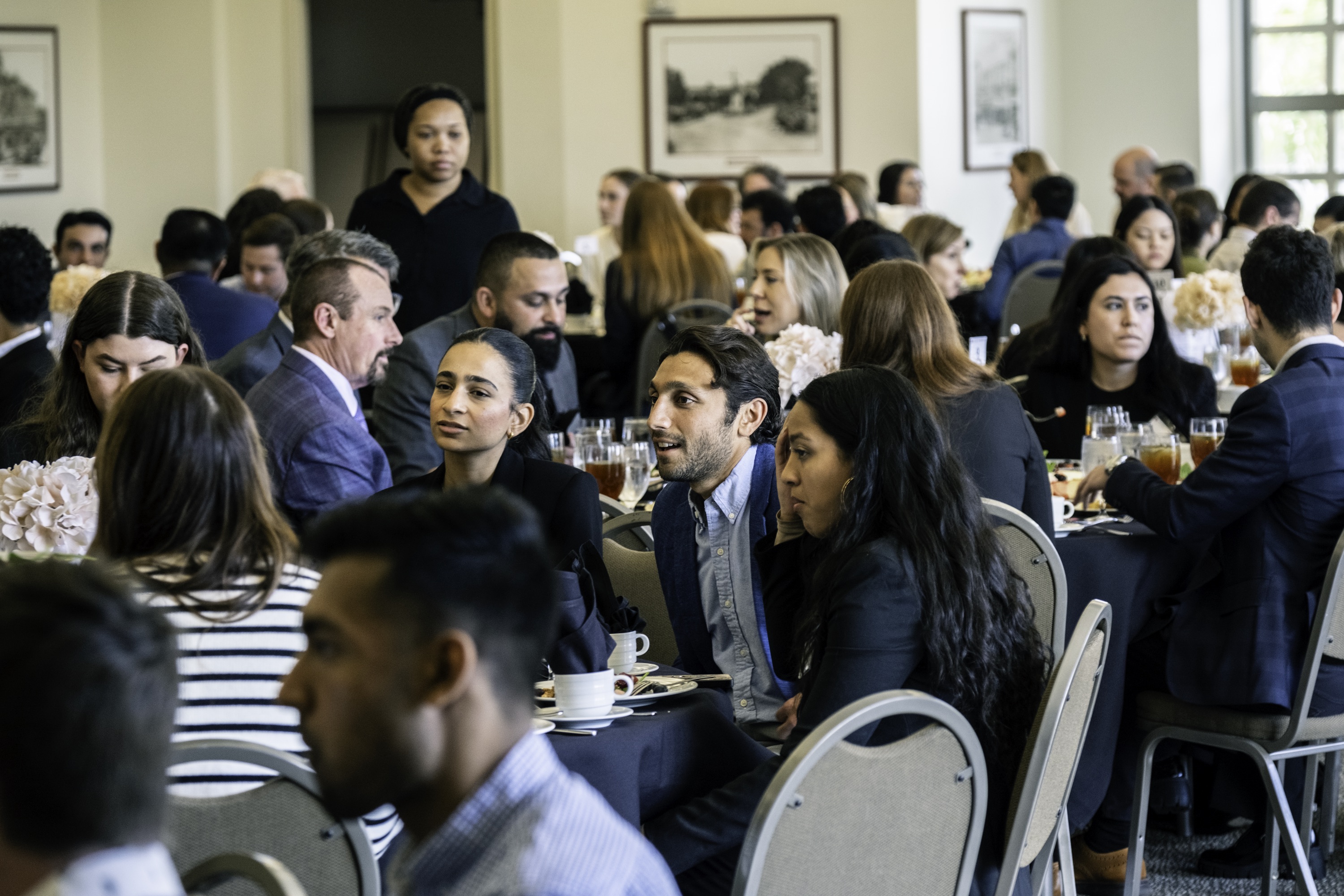 Photograph of attendees at the Fowler School of Law Scholars Weekend luncheon