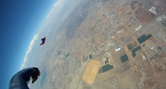 Aerial picture of a skydiver descending to the ground
