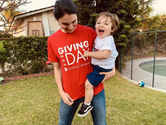 Sarah Buckley in Giving Day shirt with son Finn