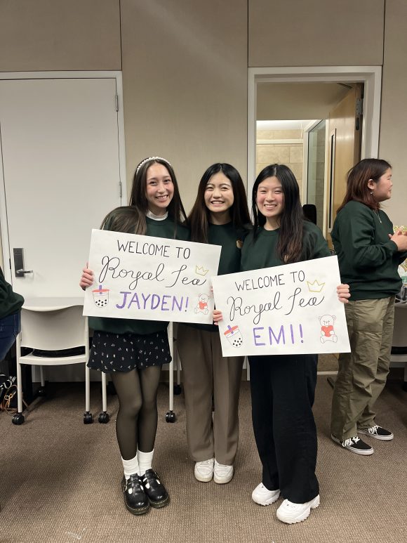Emi with Friends and signs
