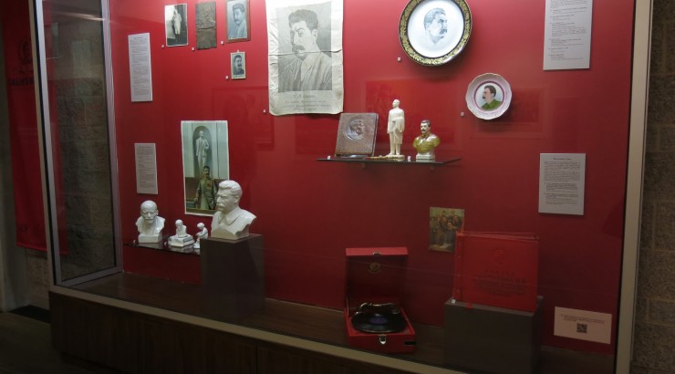 pieces of artwork in display case