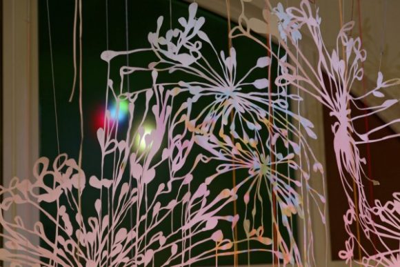 Chris Natrop, Between Light and Half Light, watercolor, glitter, aluminum powder on hand cut paper, tape, string, color window clings, 2016