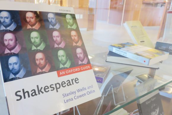 Shakespeare book on display case.