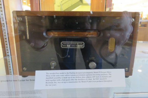 Old oxygen meter in display case.