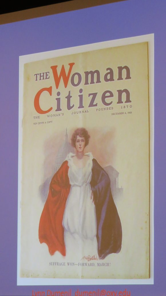 Photograph of a slide depicting a journal cover reading "The Woman Citizen," with a woman in red, white, and blue