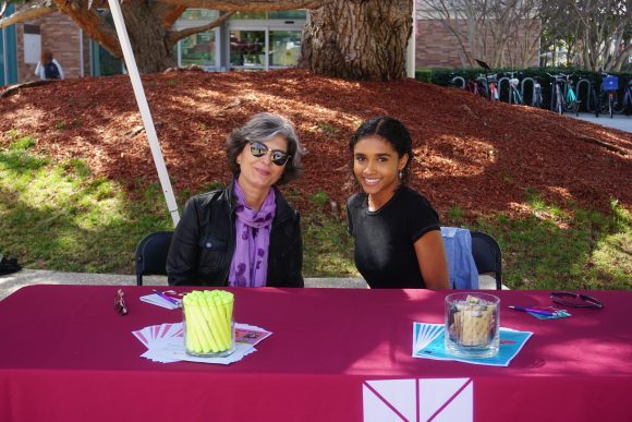 Librarian Shahrzad Khosrowpour with student employee Ruby Blakesleay.