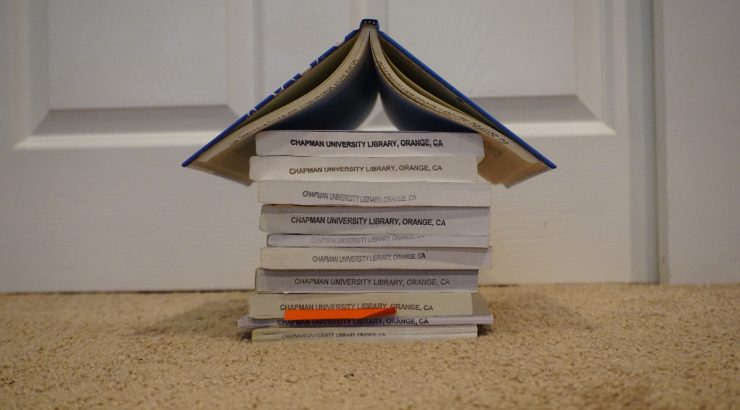 A stack of books, all facing to show their 