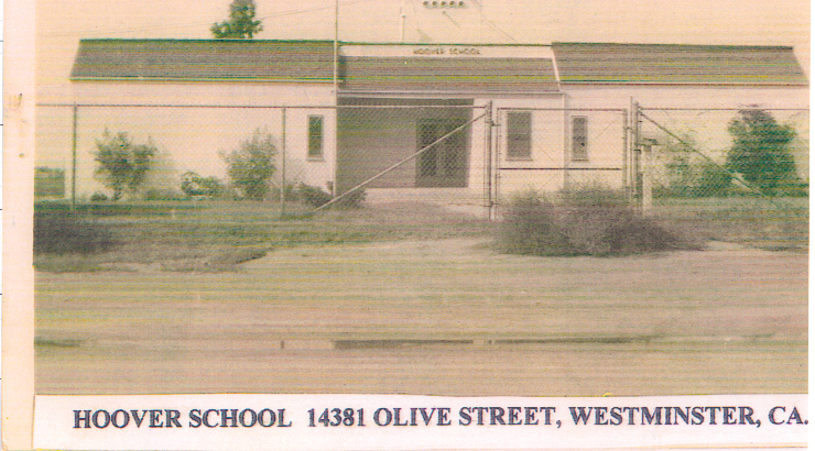 Newspaper photograph of the Hoover School with text across the bottom that reads, 