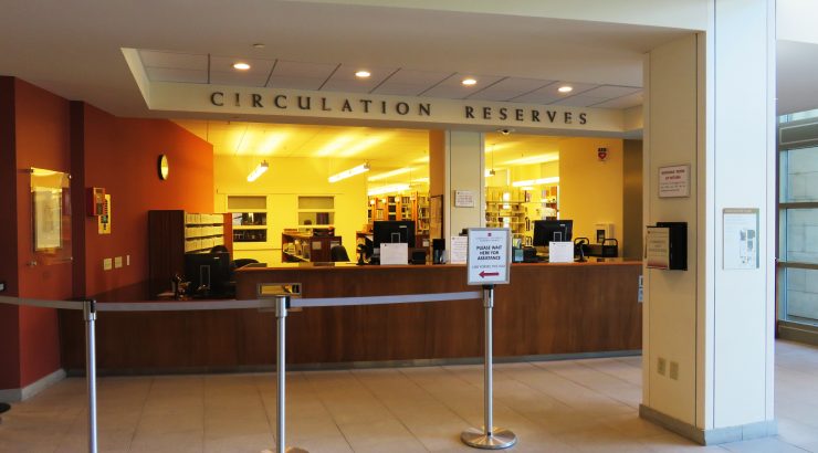 Photograph of the Circulation Desk in the Leatherby Libraries