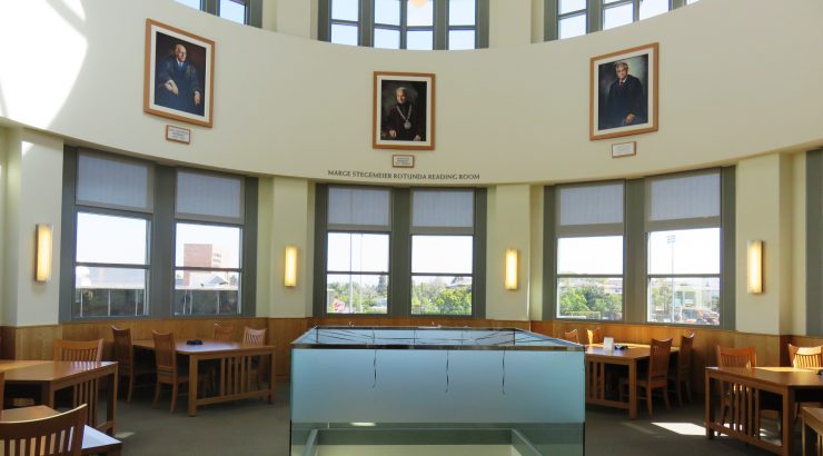 Photograph of the Marge Stegemeier Rotunda Reading Room on the 3rd floor of the Leatherby Libraries, empty.