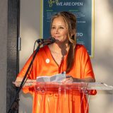 Kenia Hernandez Cueto (Ph.D. ’17) speaks at Friendly Center’s 100th birthday celebration on April 8, which was honored as Friendly Center Day by the City of Orange.