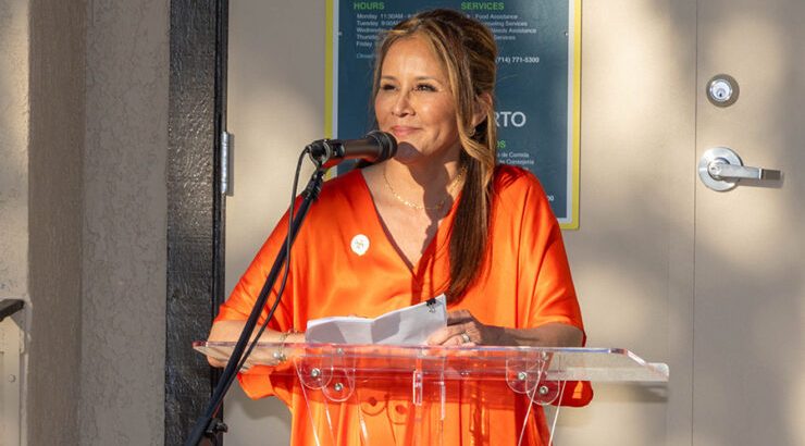 Kenia Hernandez Cueto (Ph.D. ’17) speaks at Friendly Center’s 100th birthday celebration on April 8, which was honored as Friendly Center Day by the City of Orange.