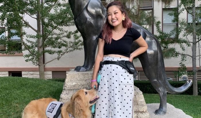 Chapman student, Kristin, and her service dog, Mailie