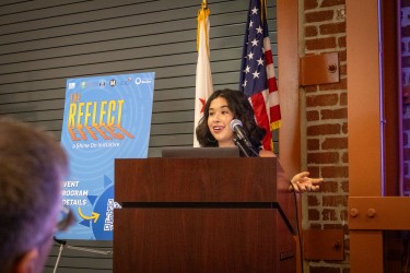 Ashley presenting research at conference