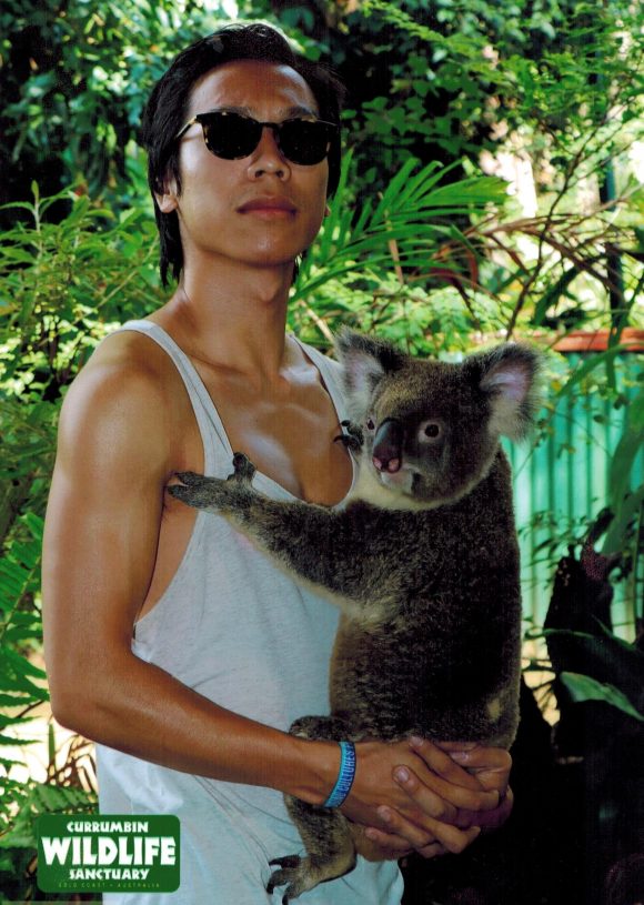 Student with koala in Australia