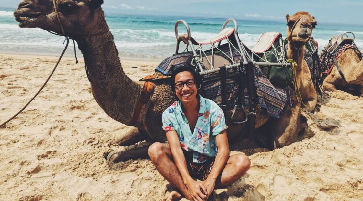 Student with camel in Australia