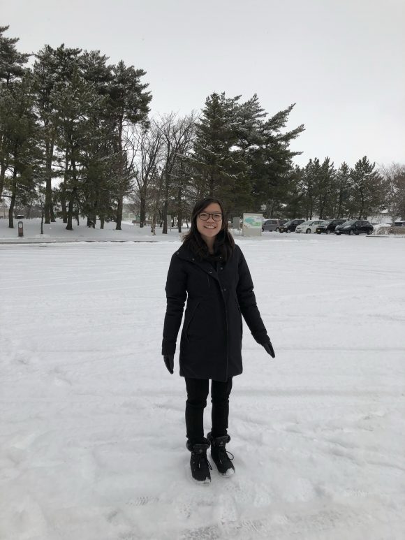 Student standing in the snow in Japan