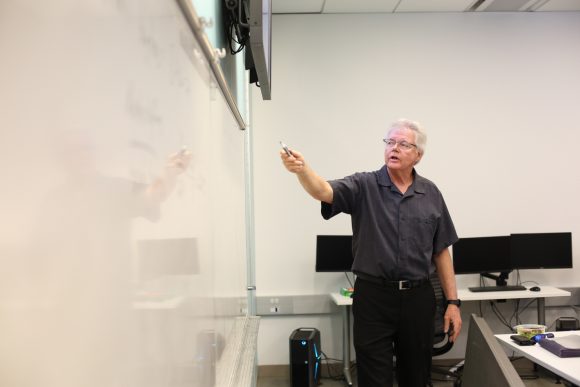 Dr. Fahy teaching in a lab